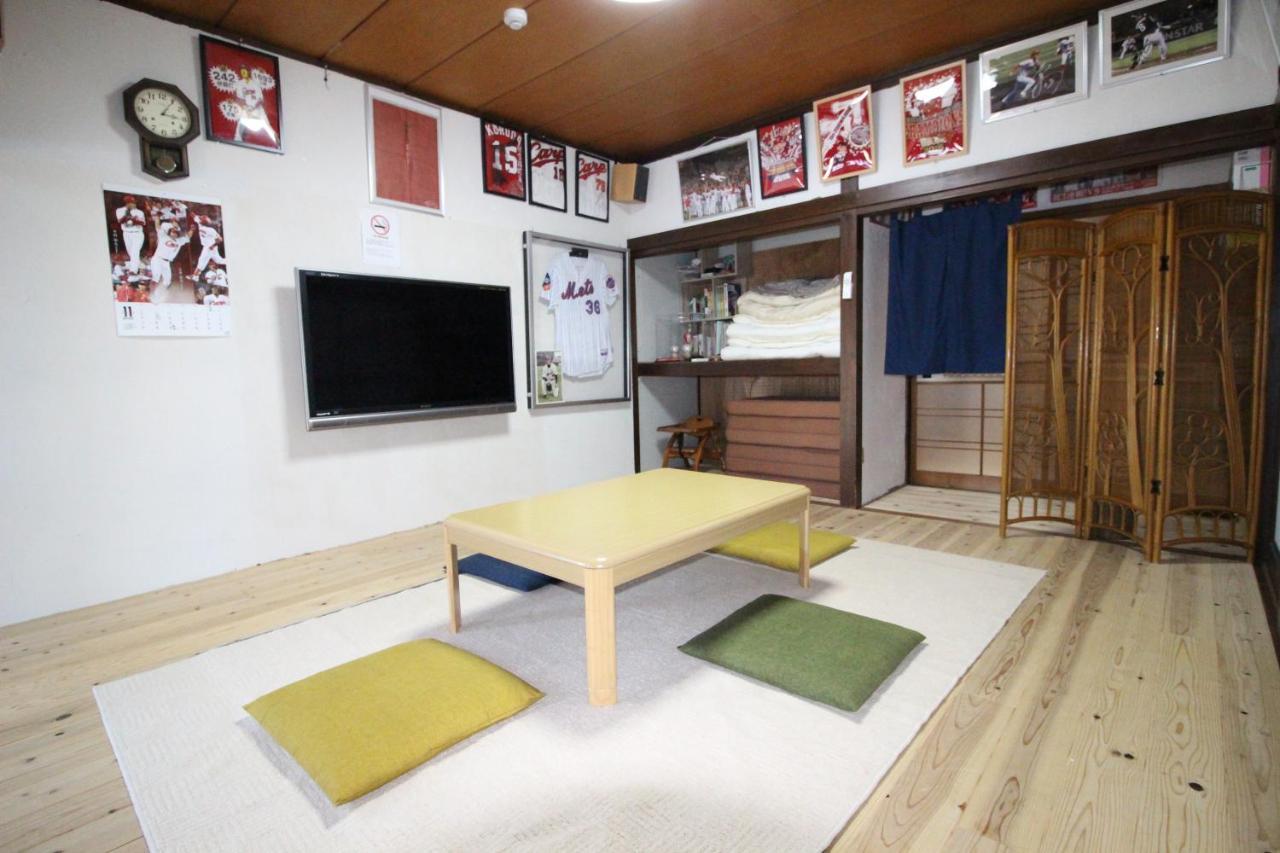 Hiroshima Fan'S Hostel Hatsukaichi Værelse billede