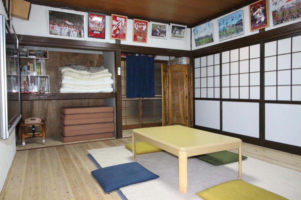 Hiroshima Fan'S Hostel Hatsukaichi Værelse billede